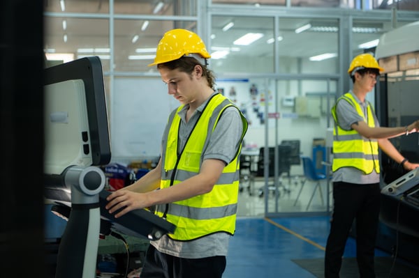 young-man-factory-worker-wearing-a-hard-hat-lookin-2025-01-09-15-33-40-utc